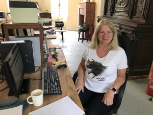 Jan volunteering at her application desk