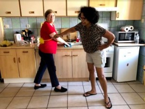 Volunteers Viv and Linda having a laugh while housekeeping at La Giraudière in France