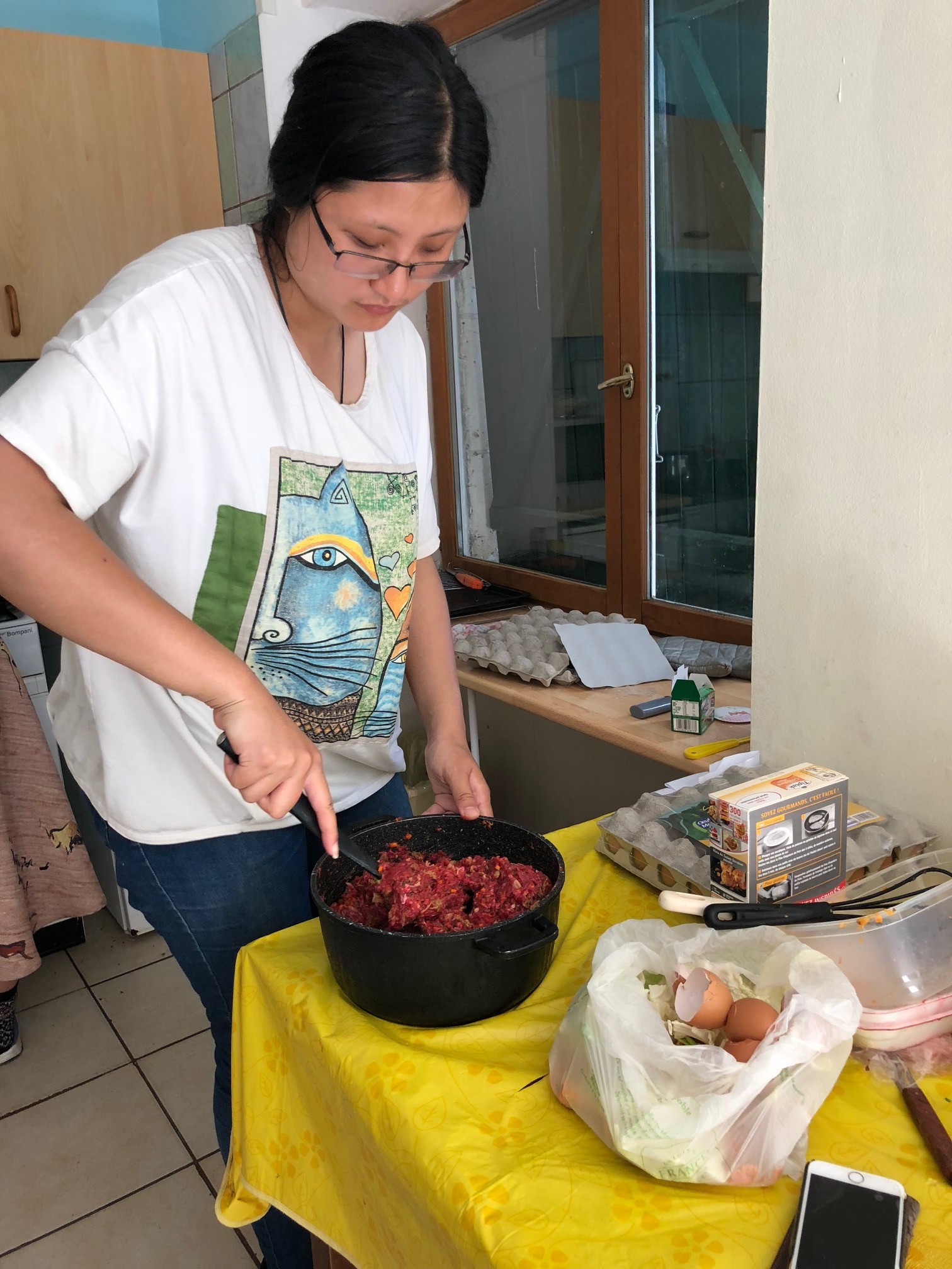 Cooking meatballs for the locals